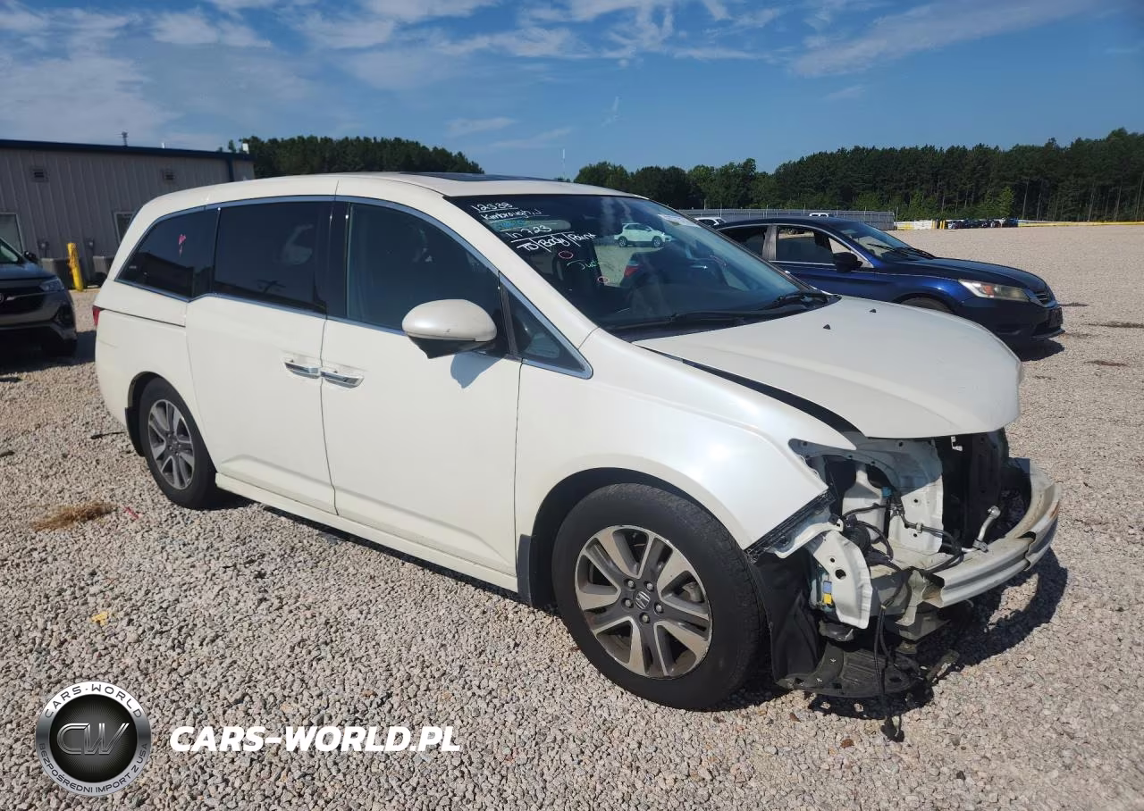 2017 Honda Odyssey Touring VIN:5FNRL5H95HB023351 - 4