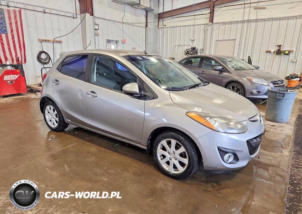 2011 Mazda Mazda2 VIN:JM1DE1HYXB0113654 - 4