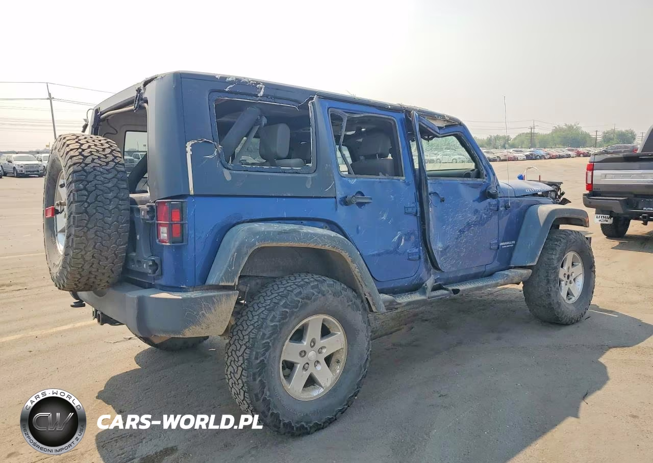 2010 Jeep Wrangler Unlimited Rubicon VIN:1J4BA6H17AL195384 - 3