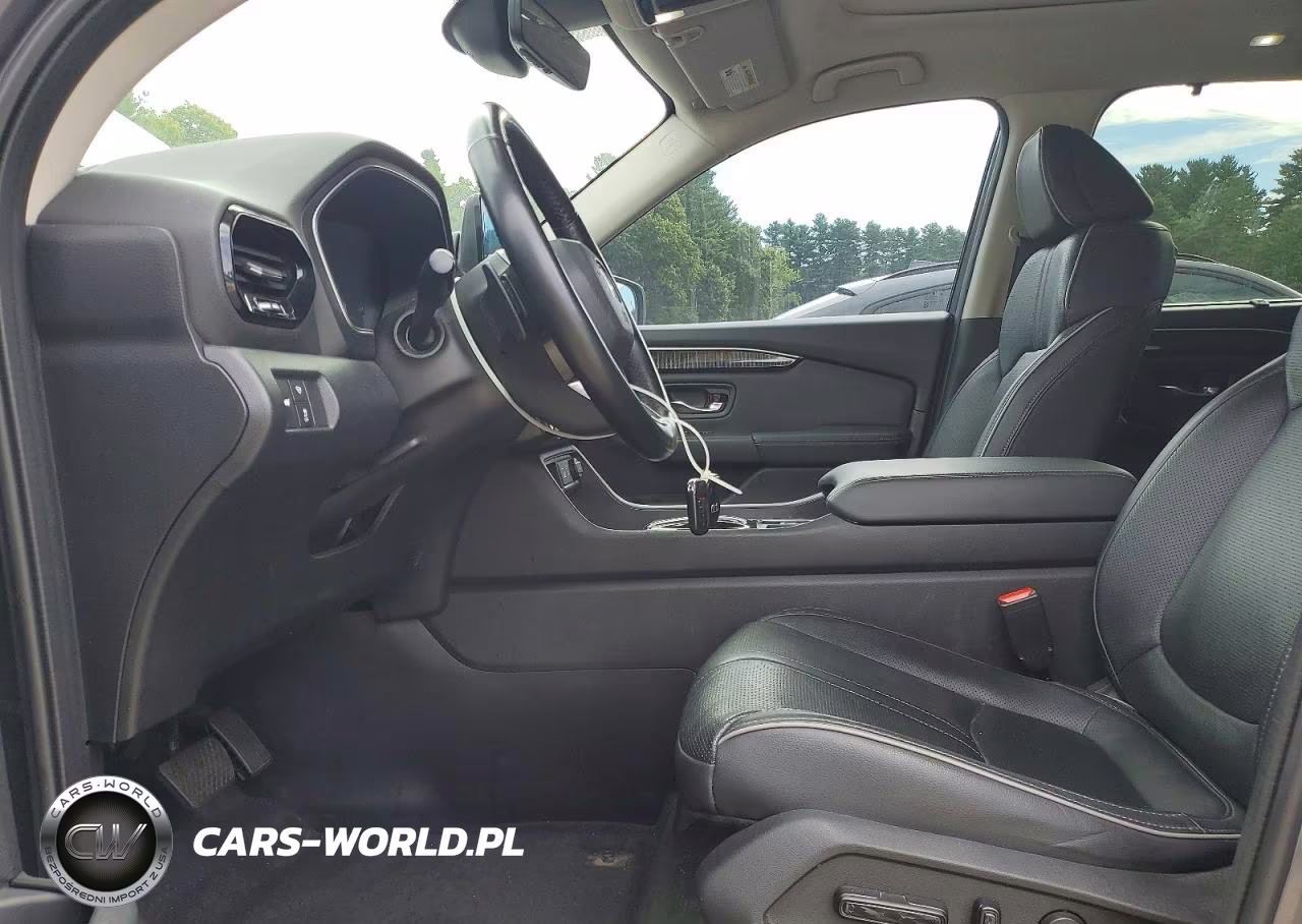 2023 Honda Pilot Elite VIN:5FNYG1H80PB010666 - 7