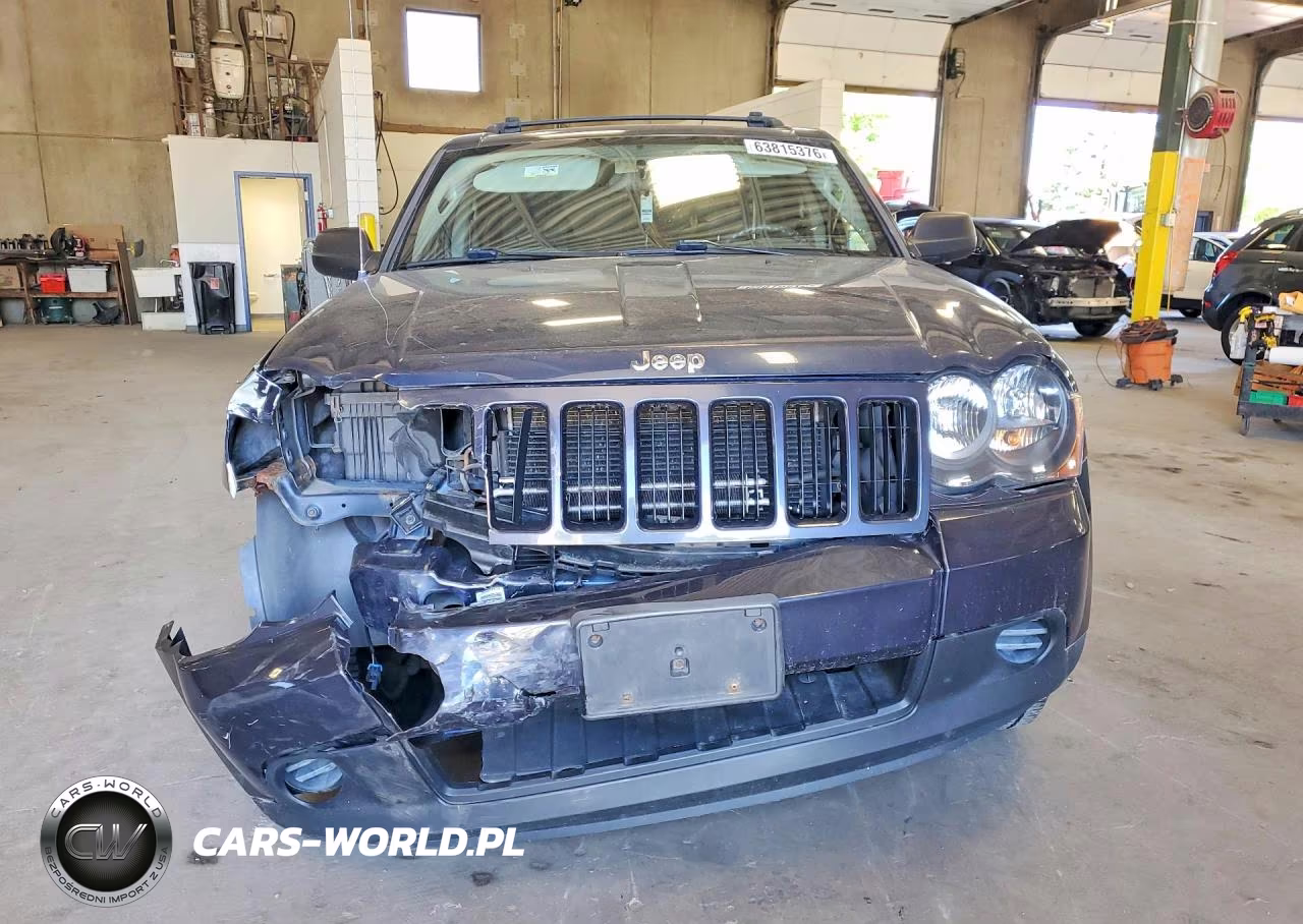 2009 Jeep Grand Cherokee Laredo VIN:1J8GR48K29C512316 - 5
