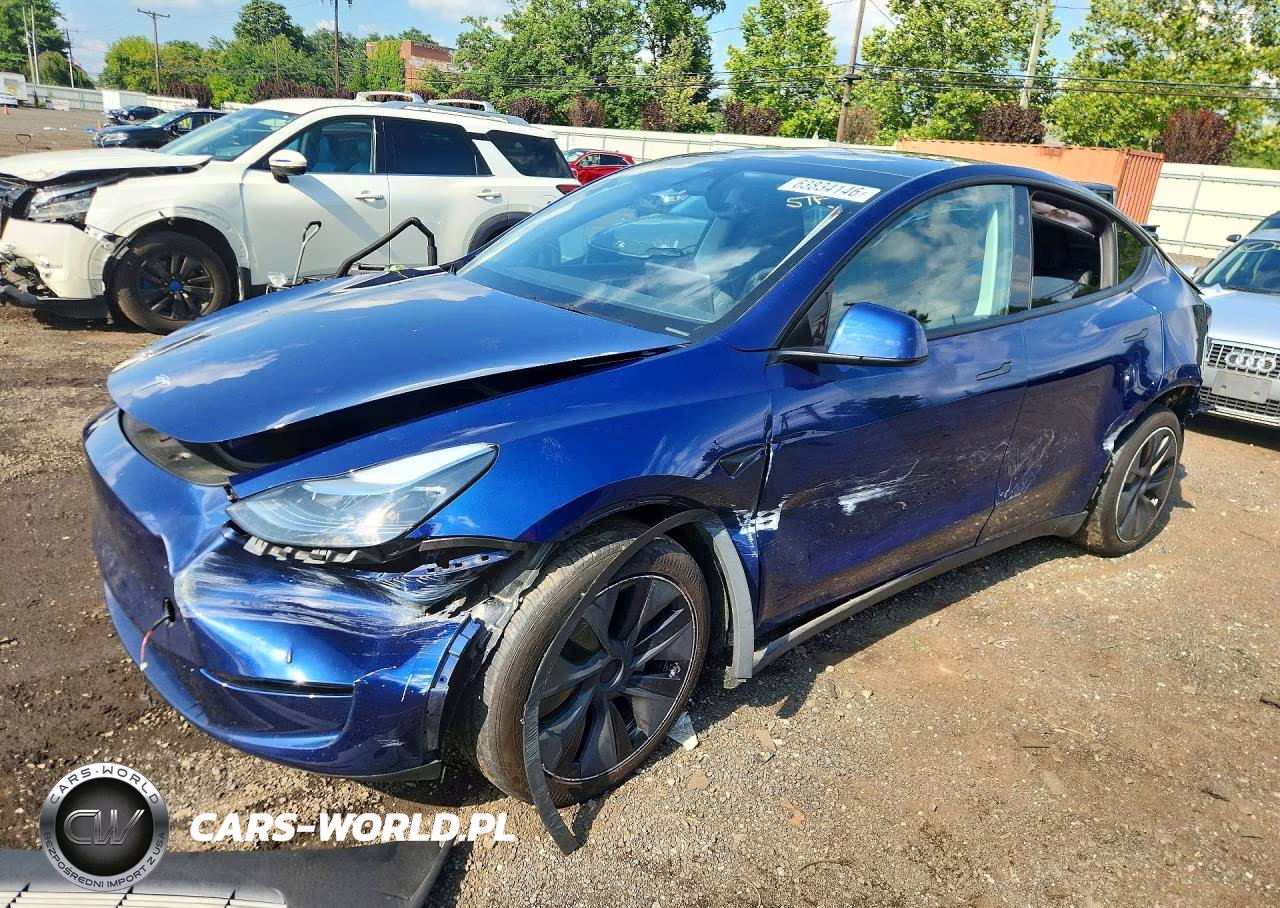 2025 Tesla Model Y VIN:7SAYGAEE0SF260642 - 1