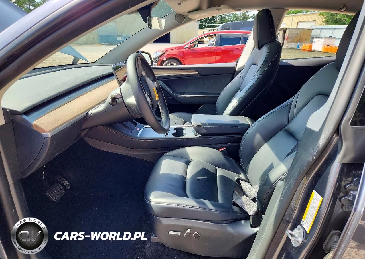 2023 Tesla Model Y VIN:7SAYGDEDXPF949703 - 7