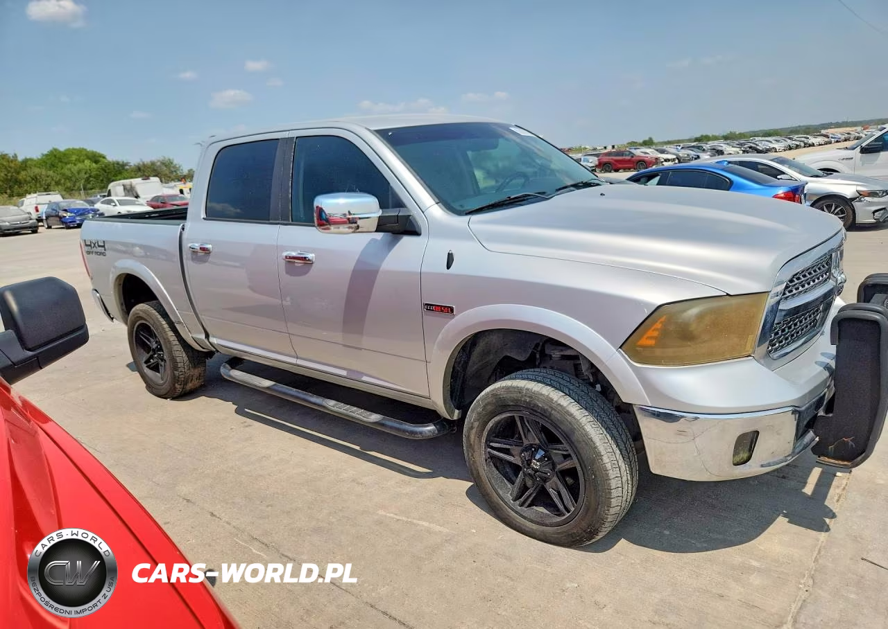 2015 Ram 1500 Laramie VIN:1C6RR7NM9FS658180 - 4