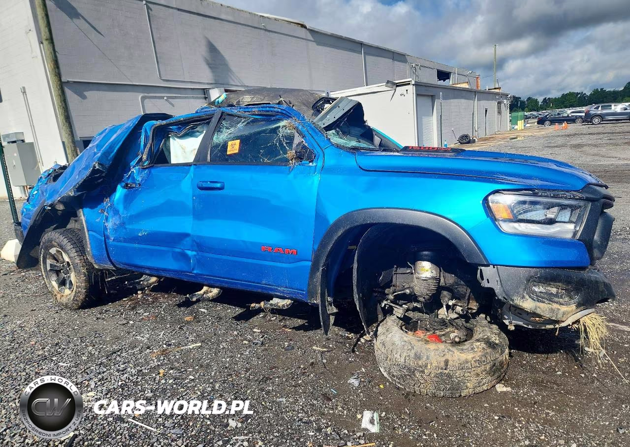 2022 Ram 1500 Rebel VIN:1C6SRFLT2NN319246 - 4