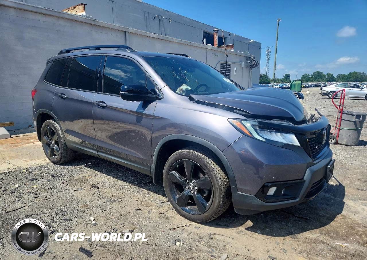2019 Honda Passport Elite VIN:5FNYF8H06KB004627 - 4