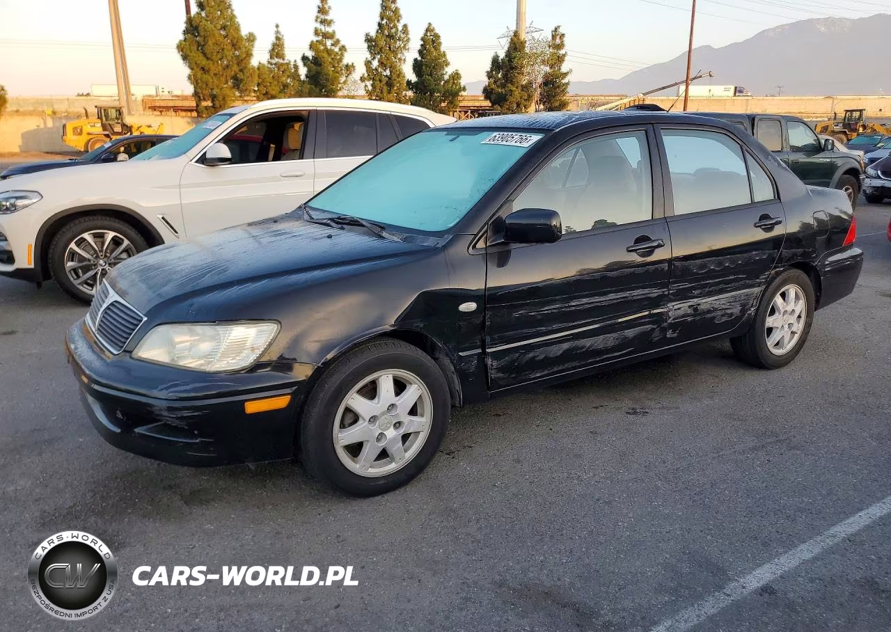 2002 Mitsubishi Lancer Ls VIN:JA3AJ36E92U080415 - 1