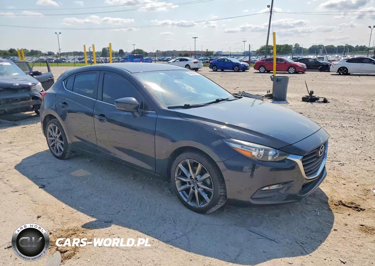 2018 Mazda 3 Touring VIN:3MZBN1L37JM233925 - 4