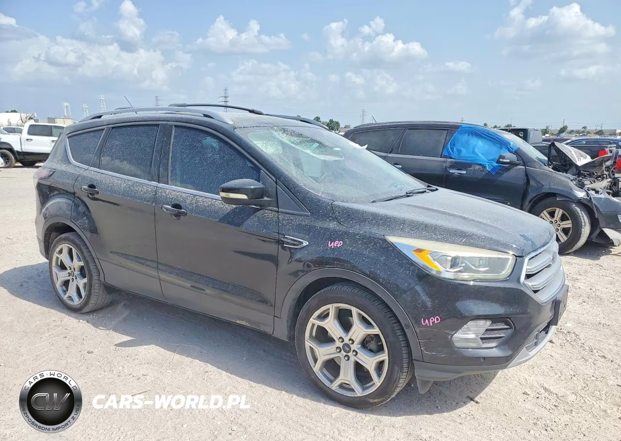 2017 Ford Escape Titanium VIN:1FMCU0J99HUA60857 - 4