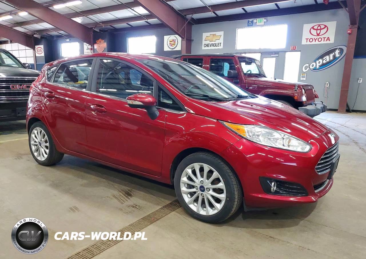 2017 Ford Fiesta Titanium VIN:3FADP4FJ3HM123956 - 4