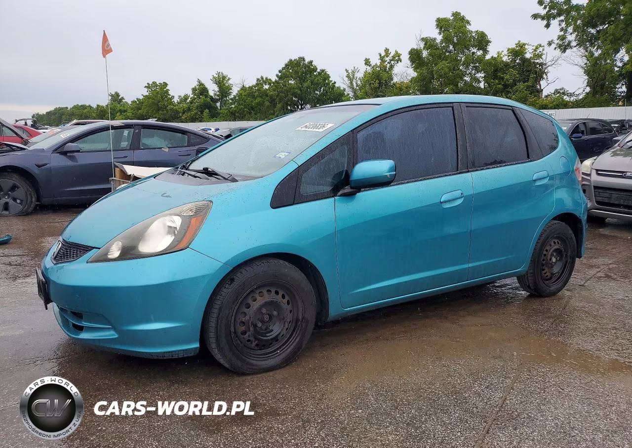 2012 Honda Fit VIN:JHMGE8H35CC006598 - 1