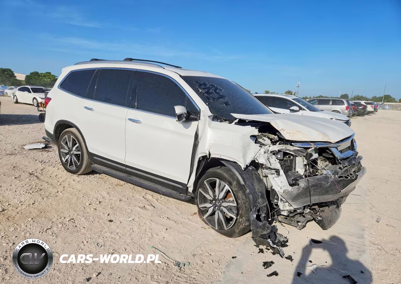 2022 Honda Pilot Touring VIN:5FNYF5H60NB020572 - 4