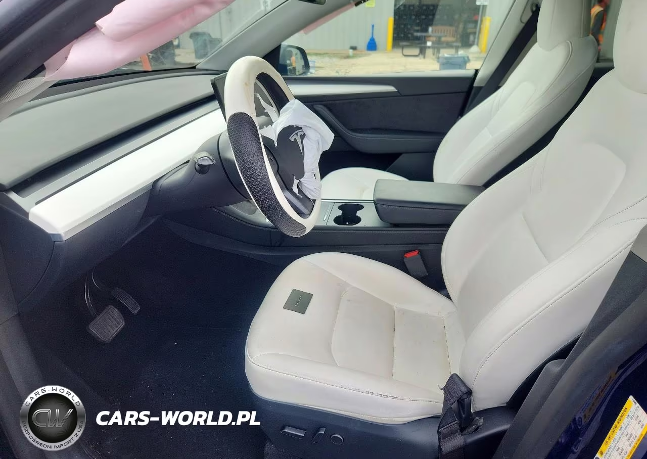 2023 Tesla Model Y VIN:7SAYGAEEXPF779480 - 7