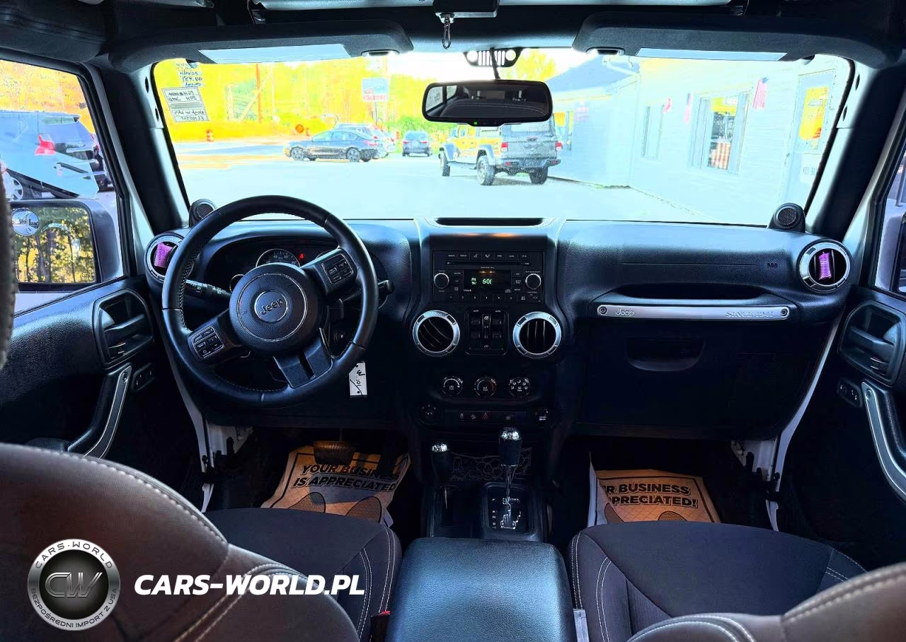 2014 Jeep Wrangler Unlimited Sahara VIN:1C4BJWEG5EL105525 - 9