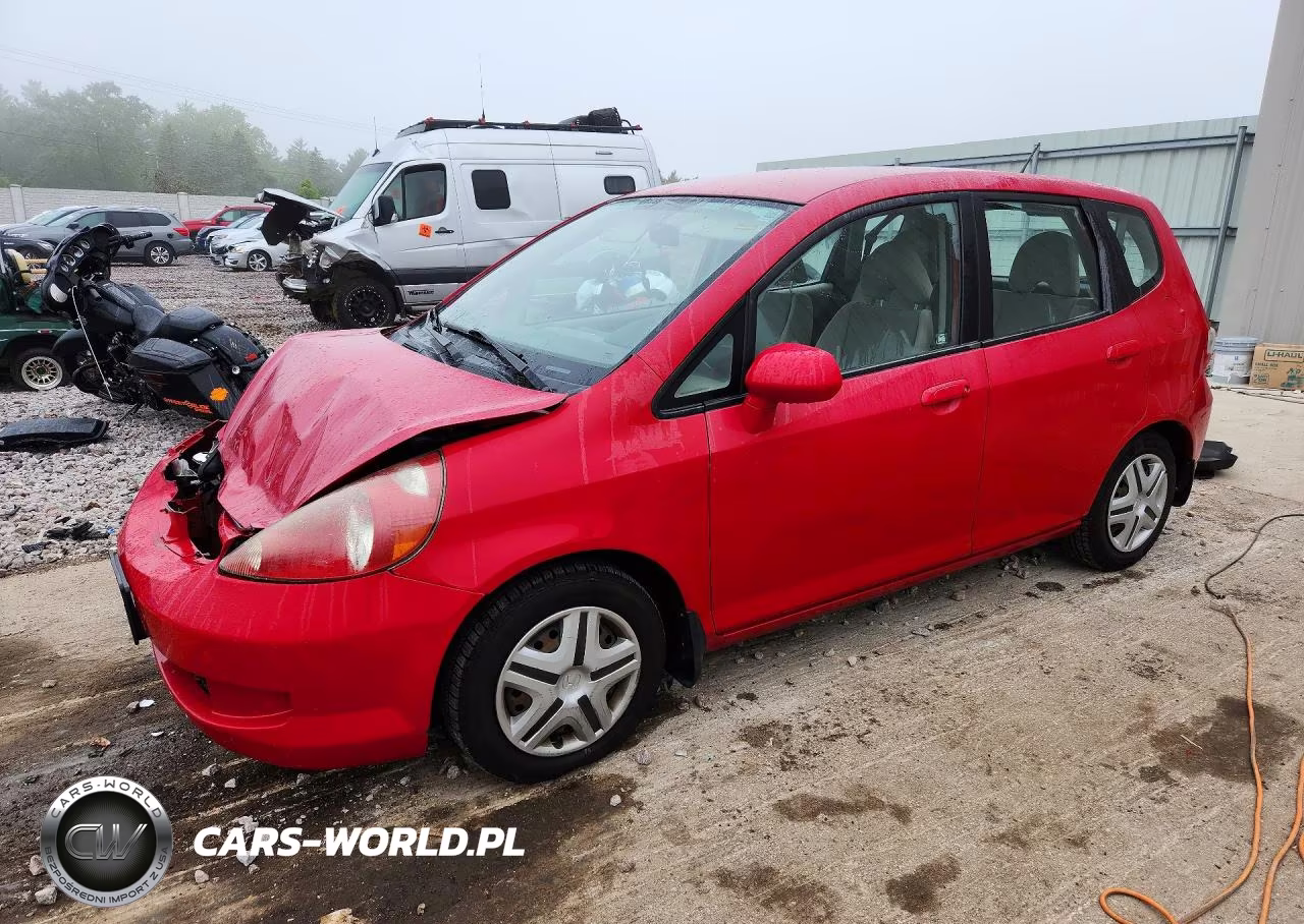 2007 Honda Fit VIN:JHMGD38497S056561 - 1