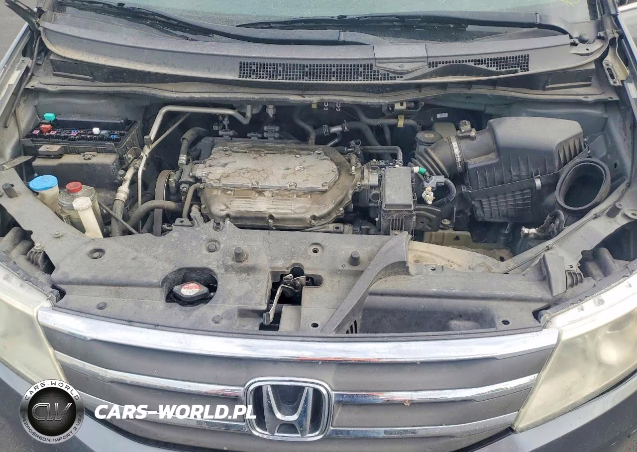 2012 Honda Odyssey Touring VIN:5FNRL5H95CB021625 - 12