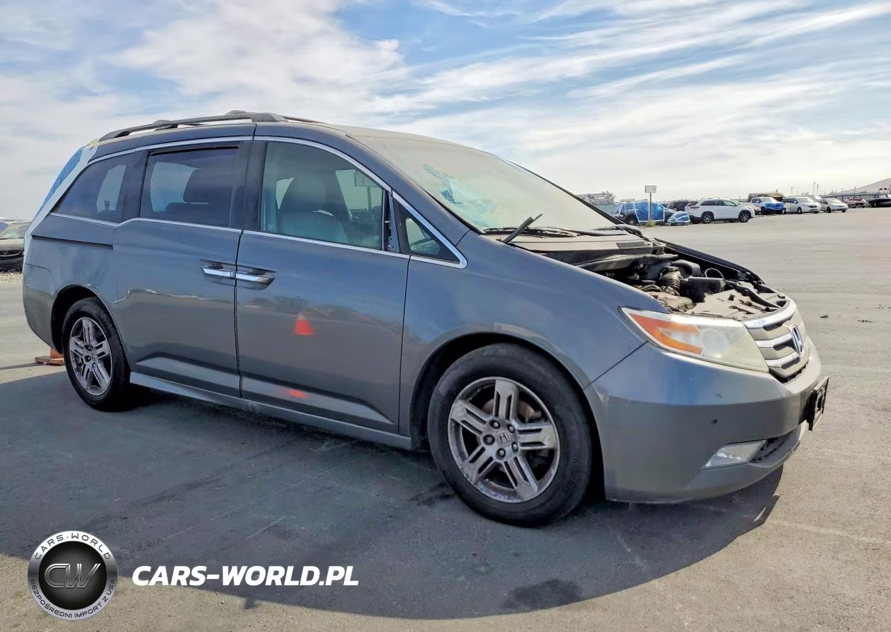 2012 Honda Odyssey Touring VIN:5FNRL5H95CB021625 - 4