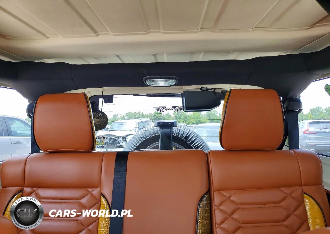 2011 Jeep Wrangler Unlimited Sahara VIN:1J4HA5H1XBL572490 - 10