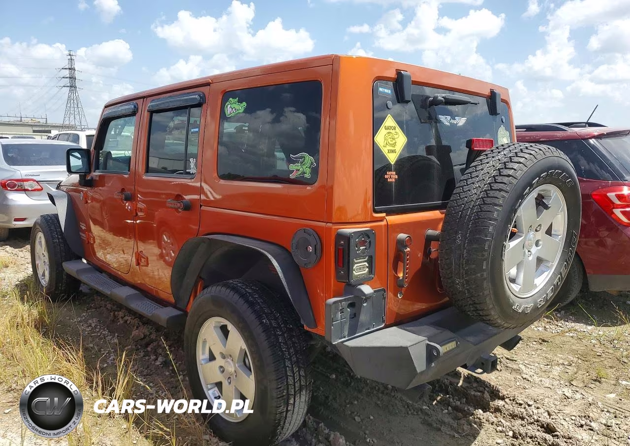 2011 Jeep Wrangler Unlimited Sahara VIN:1J4HA5H1XBL572490 - 2