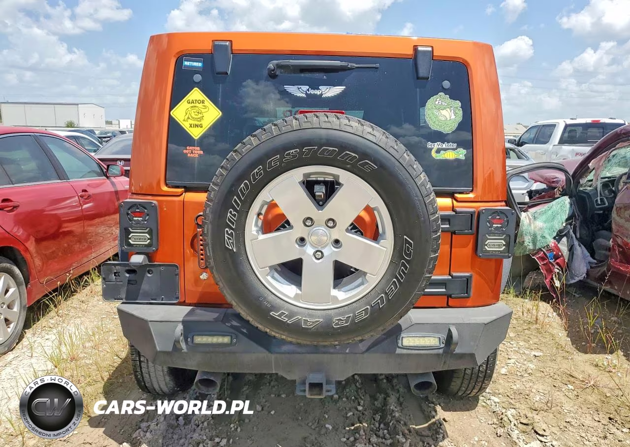 2011 Jeep Wrangler Unlimited Sahara VIN:1J4HA5H1XBL572490 - 6