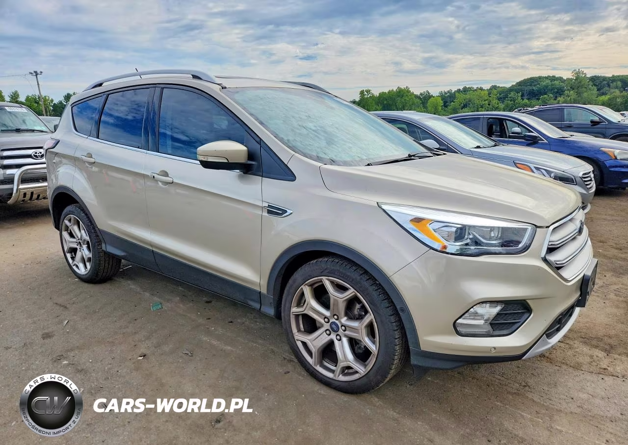 2018 Ford Escape Titanium VIN:1FMCU0J98JUA54652 - 4