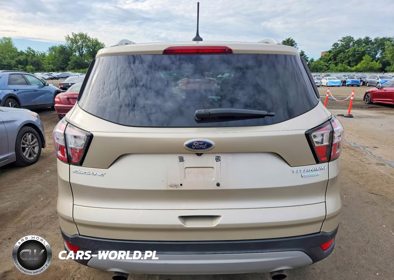 2018 Ford Escape Titanium VIN:1FMCU0J98JUA54652 - 6
