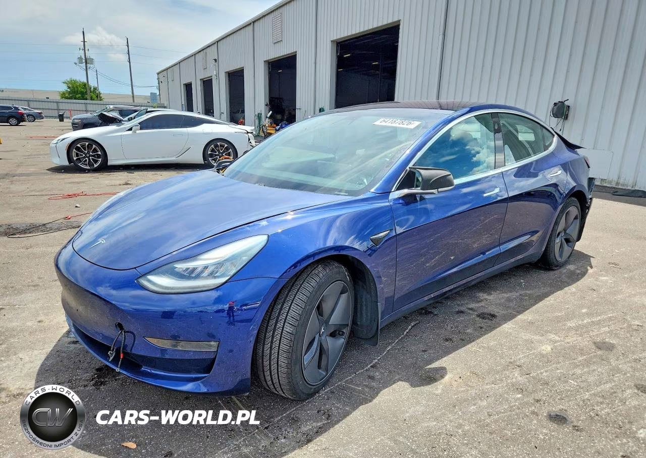 2018 Tesla Model 3 VIN:5YJ3E1EB0JF115182 - 1