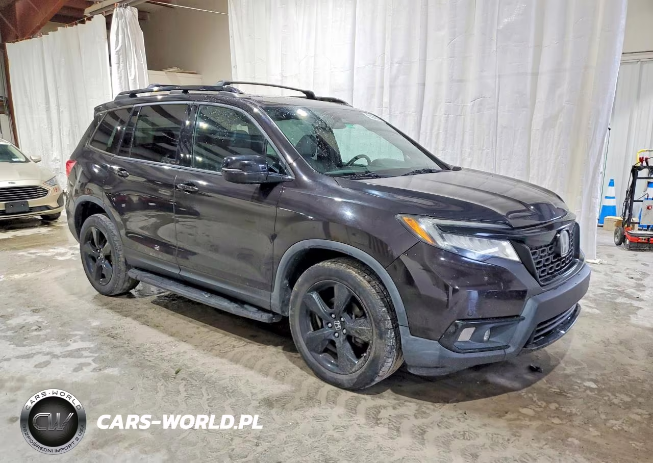 2019 Honda Passport Elite VIN:5FNYF8H05KB009060 - 4