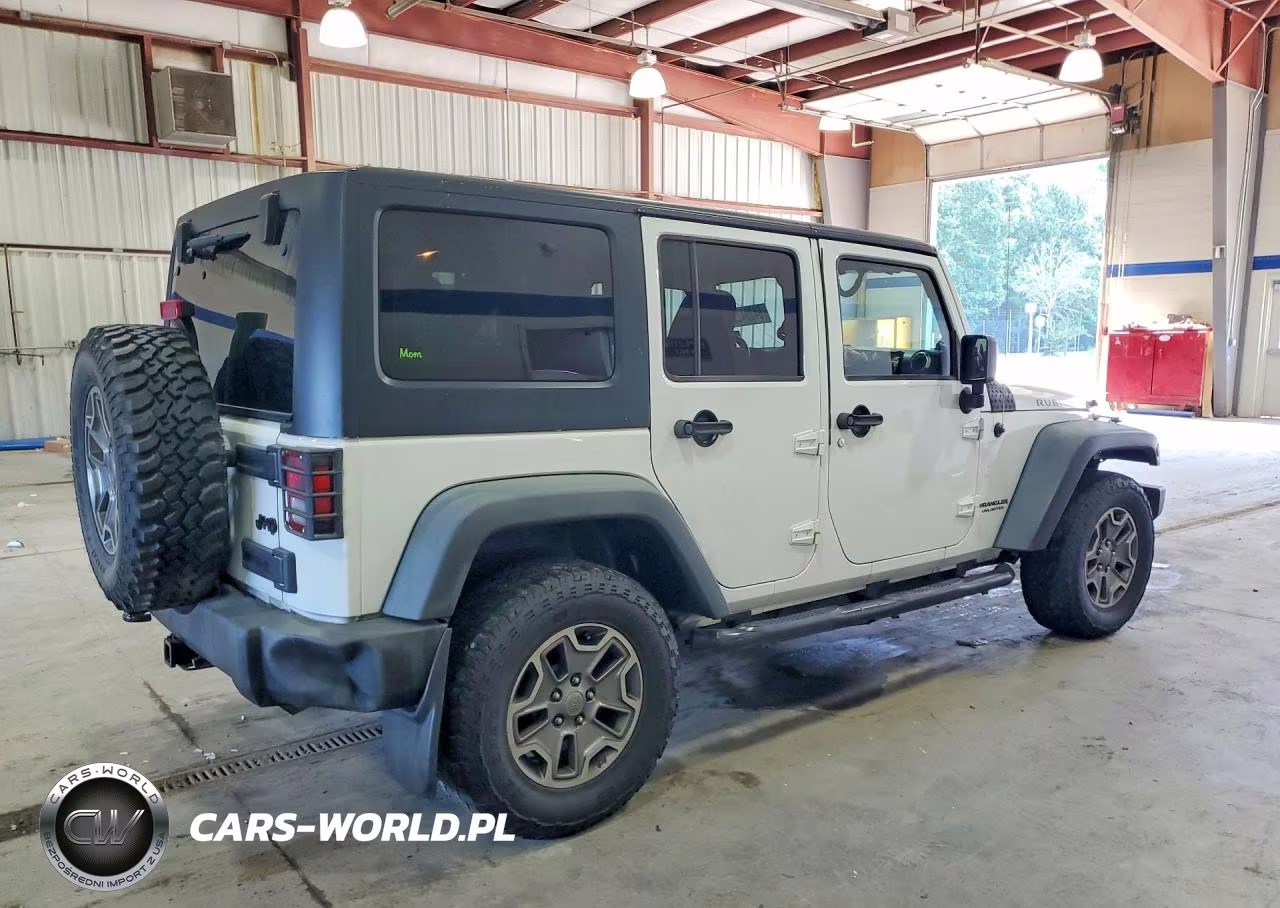 2014 Jeep Wrangler Unlimited Rubicon VIN:1C4BJWFG7EL241119 - 3