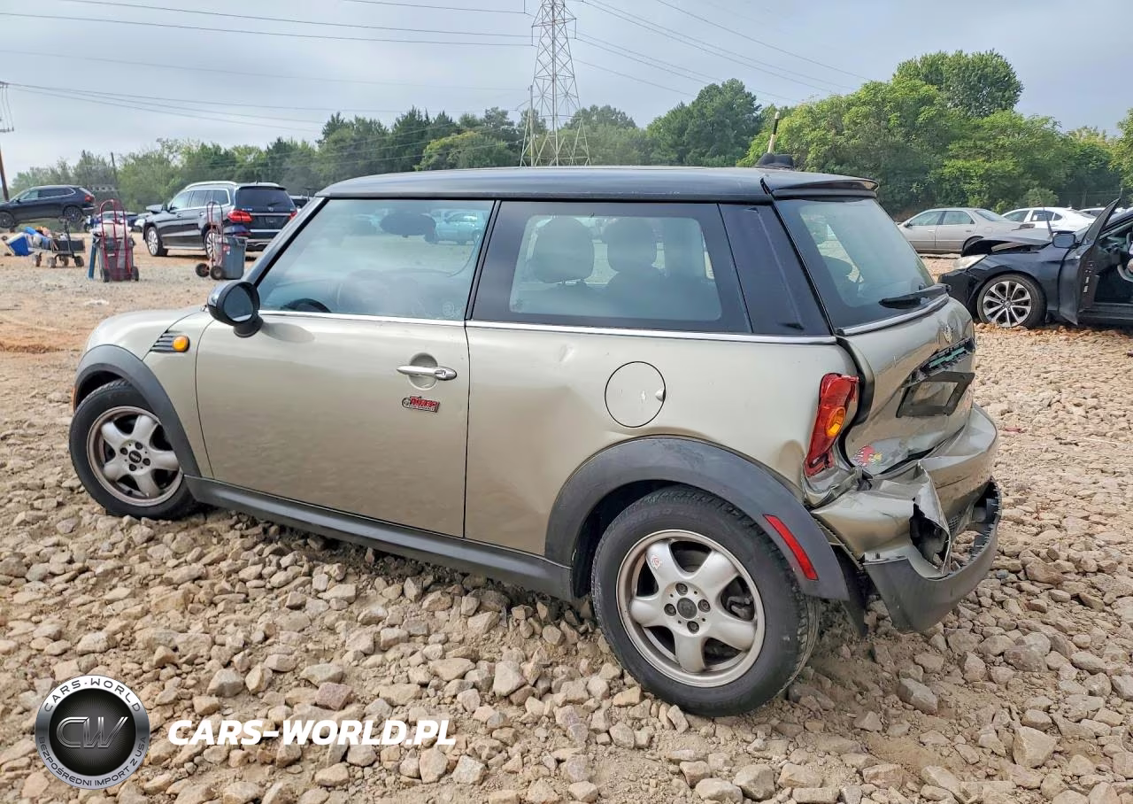 2010 Mini Cooper VIN:WMWMF3C51ATZ64807 - 2