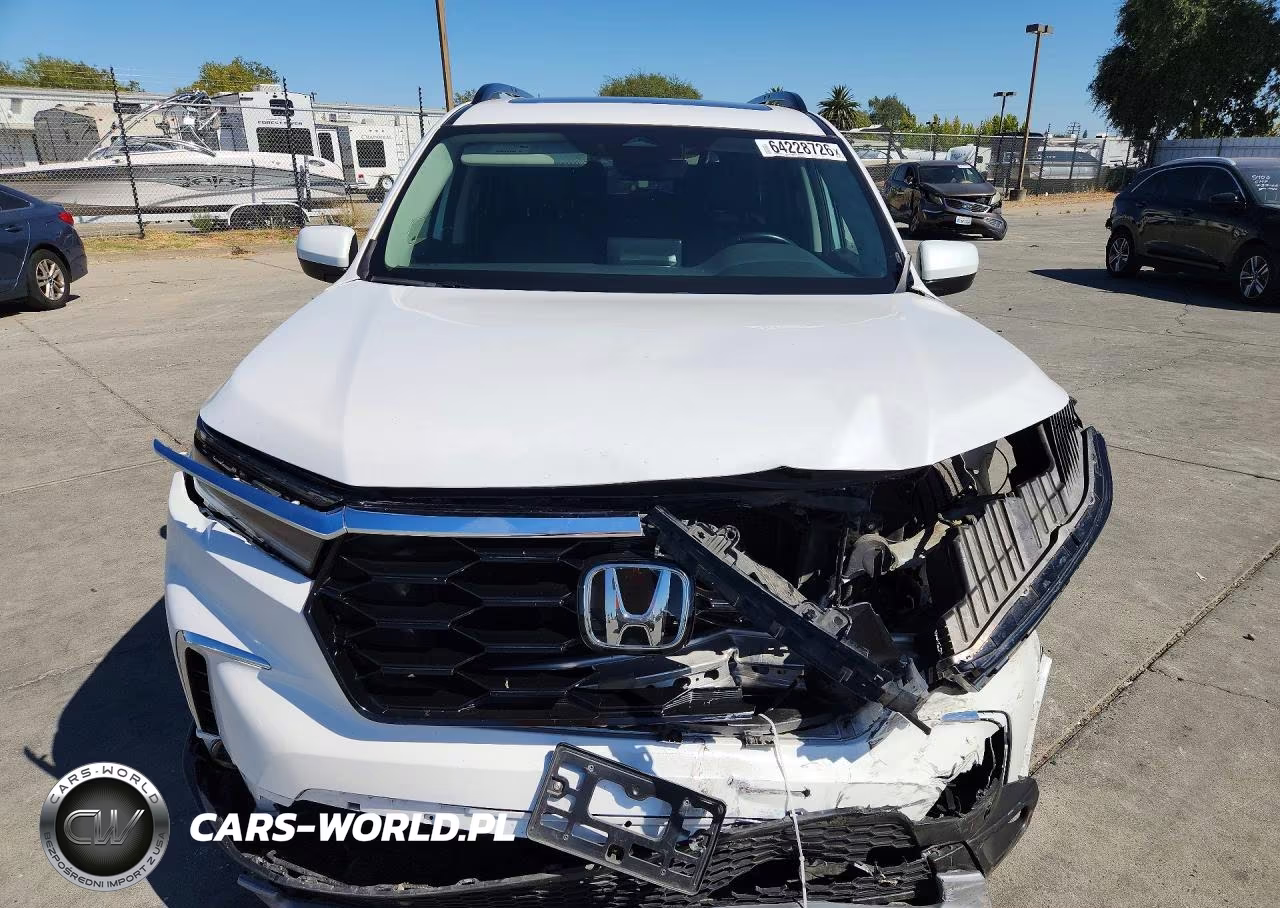2023 Honda Pilot Touring VIN:5FNYG1H78PB054244 - 5