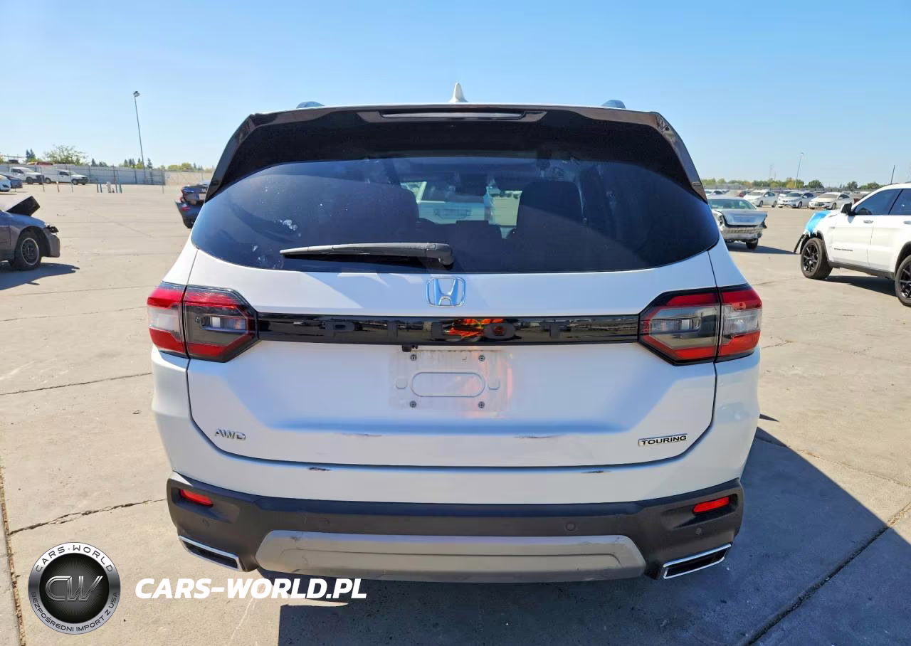 2023 Honda Pilot Touring VIN:5FNYG1H78PB054244 - 6