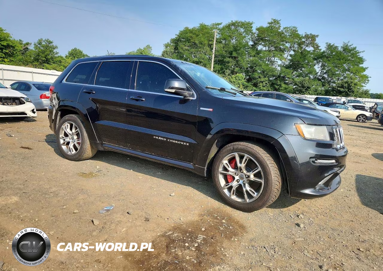 2012 Jeep Grand Cherokee Srt-8 VIN:1C4RJFDJ4CC285136 - 4