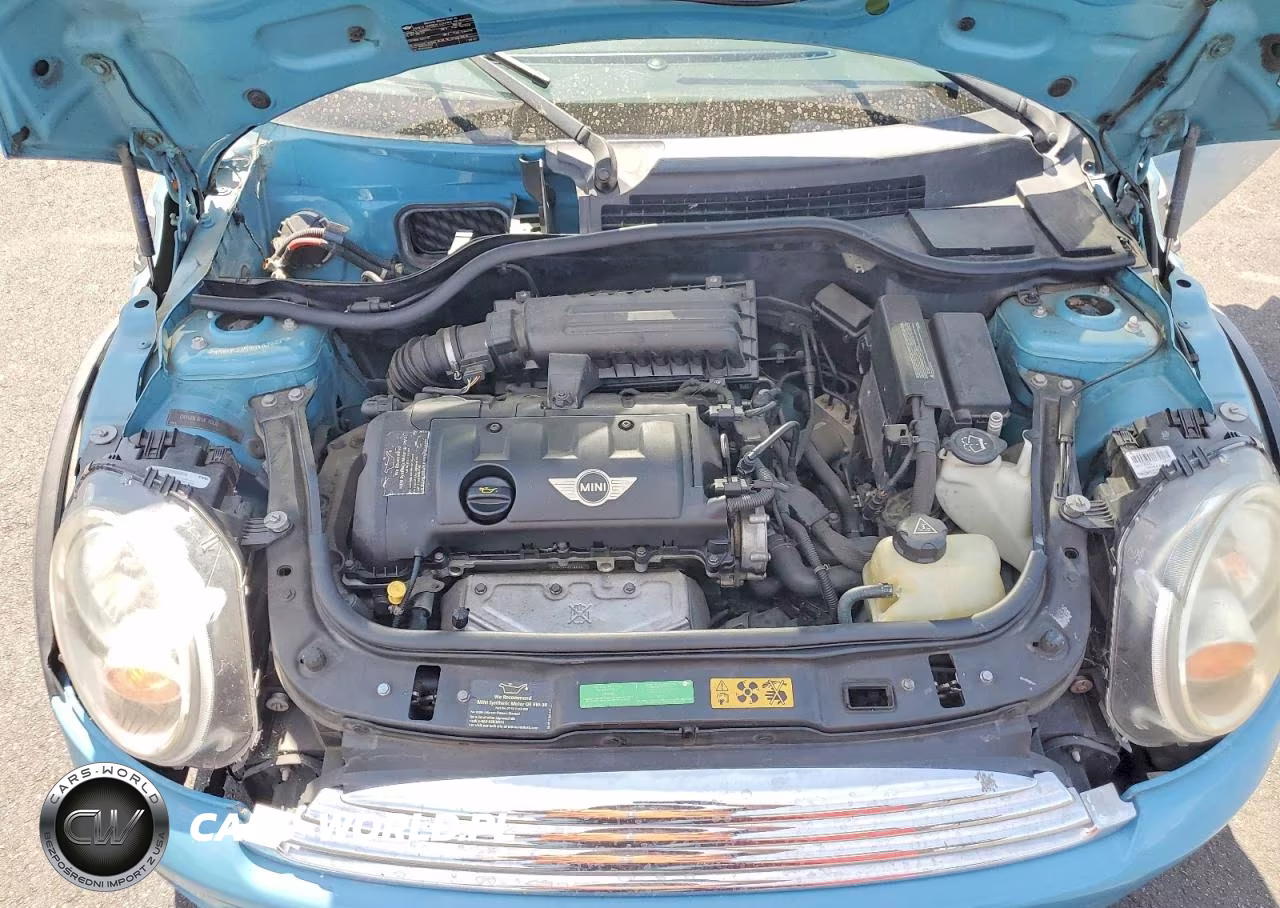 2009 Mini Cooper VIN:WMWMF33599TW76271 - 11