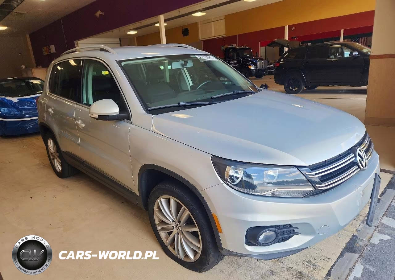 2014 Volkswagen Tiguan S VIN:WVGBV3AX7EW619279 - 4