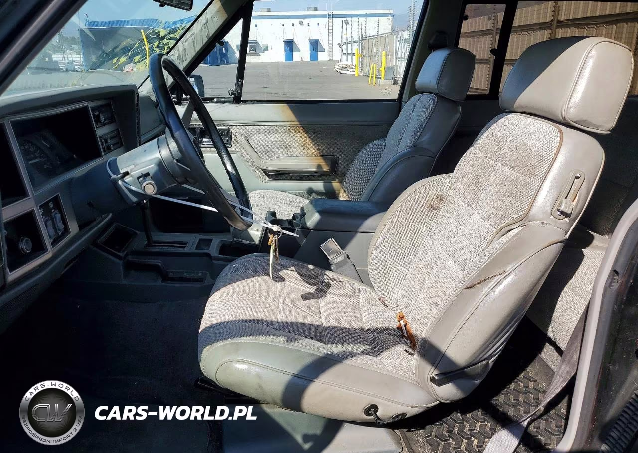 1990 Jeep Cherokee Laredo VIN:1J4FJ57L0LL286627 - 7