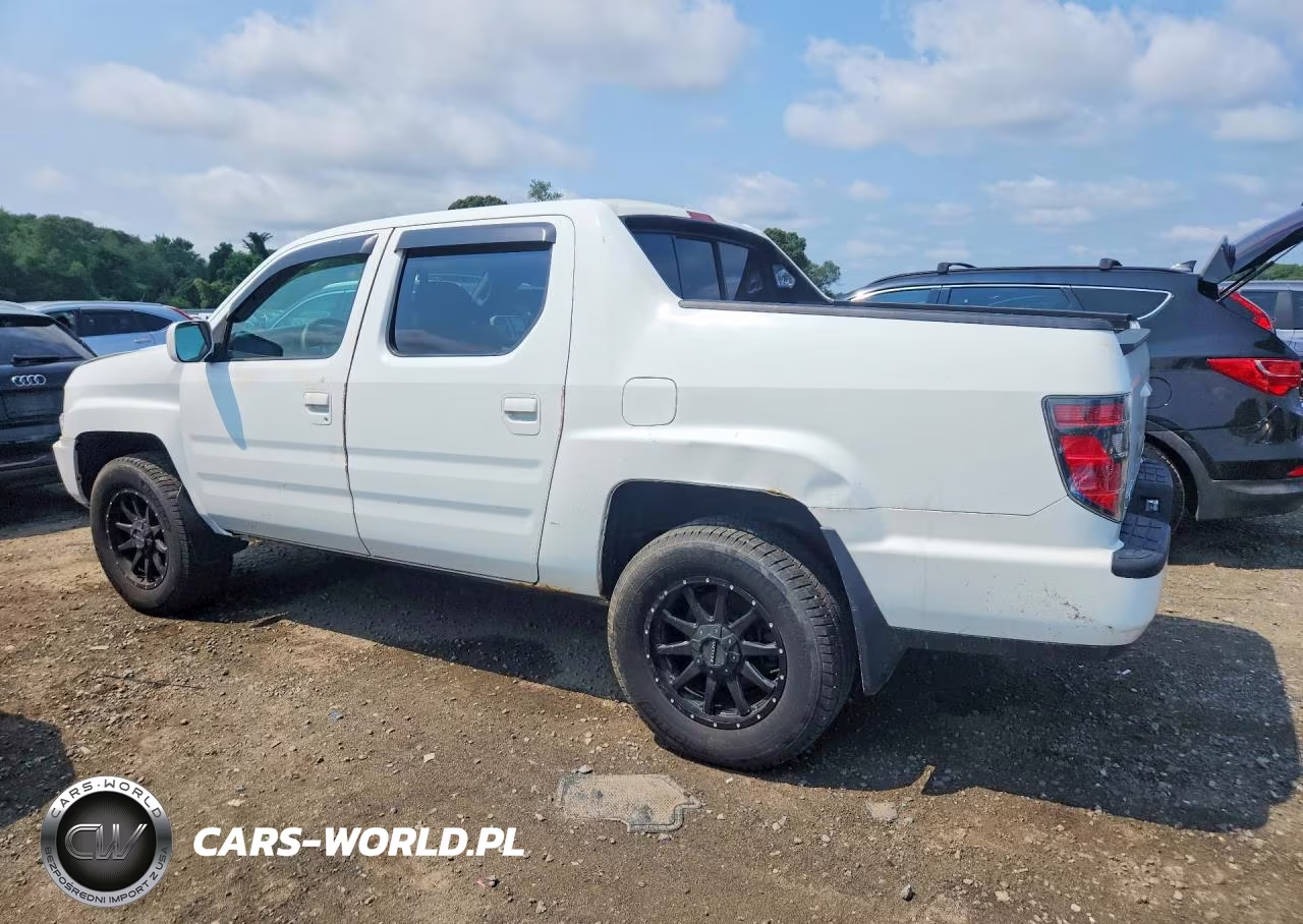2014 Honda Ridgeline Rtl VIN:5FPYK1F5XEB005924 - 2