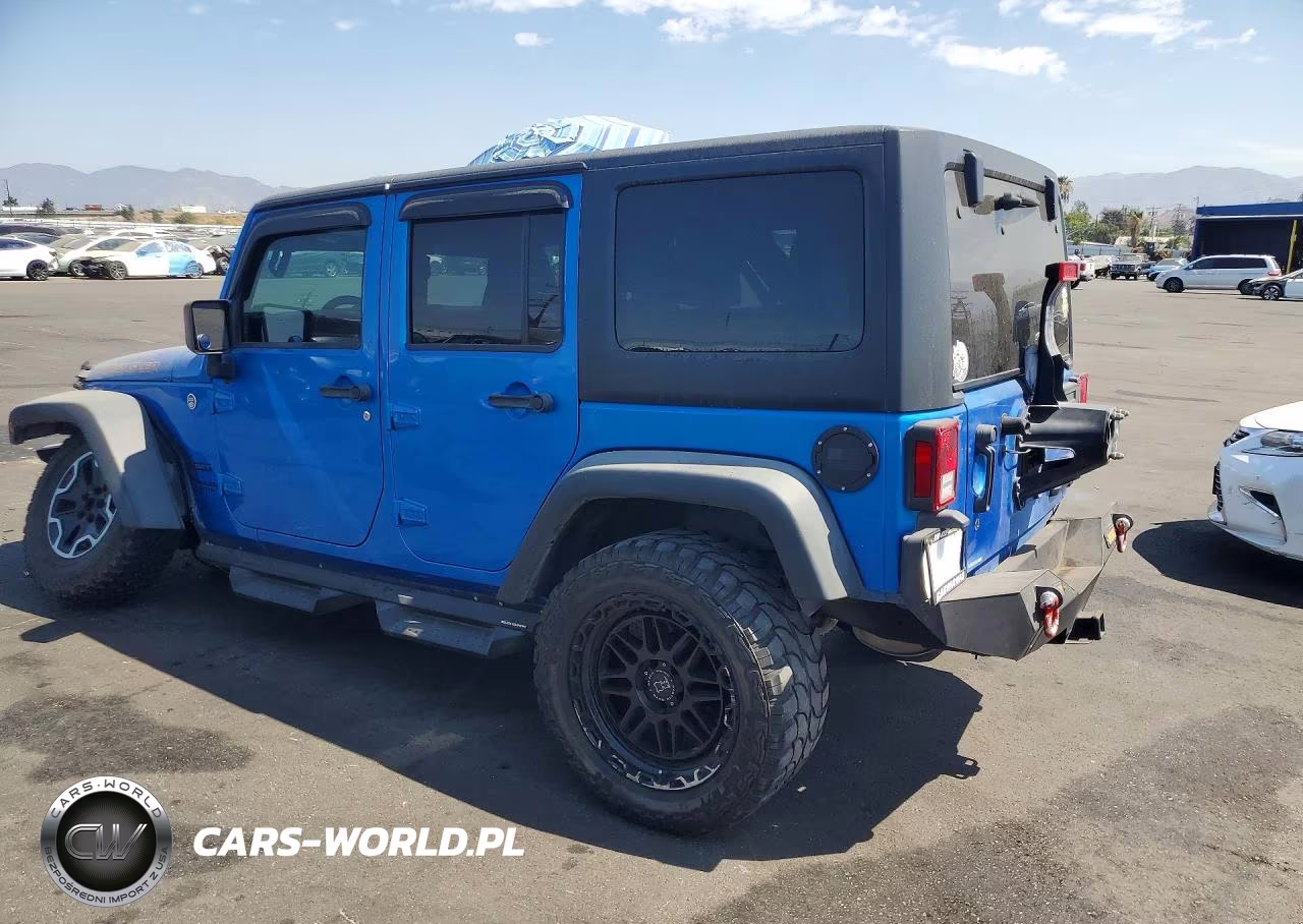 2015 Jeep Wrangler Unlimited Sport VIN:1C4BJWDG9FL570506 - 2