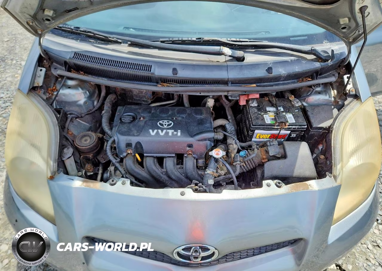 2009 Toyota Yaris Base VIN:JTDJT903X95263929 - 11