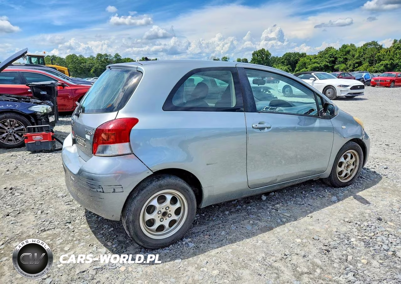 2009 Toyota Yaris Base VIN:JTDJT903X95263929 - 3