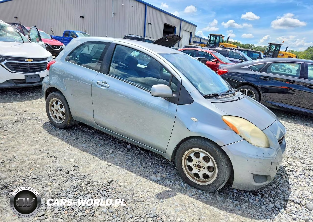 2009 Toyota Yaris Base VIN:JTDJT903X95263929 - 4