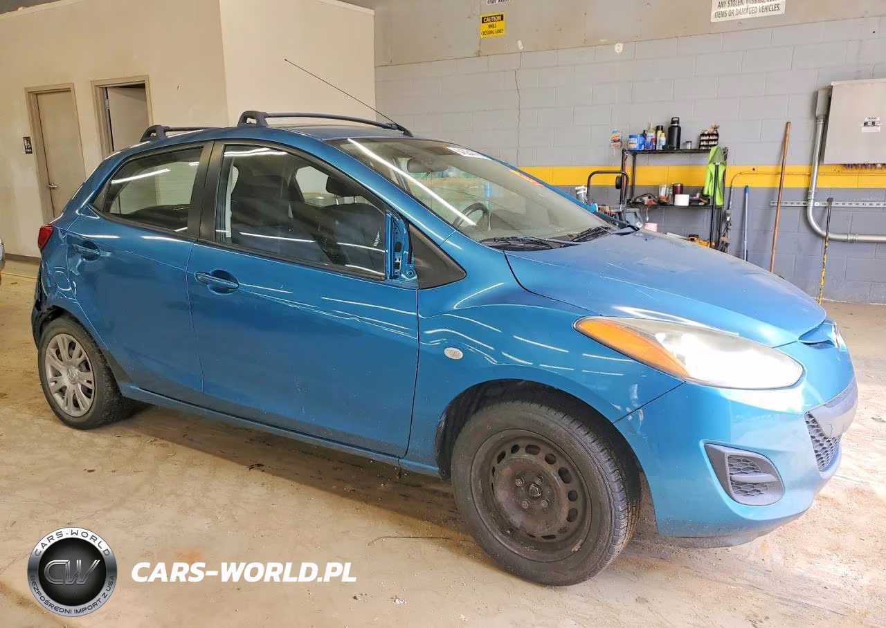 2011 Mazda Mazda 2 VIN:JM1DE1HY4B0129834 - 4