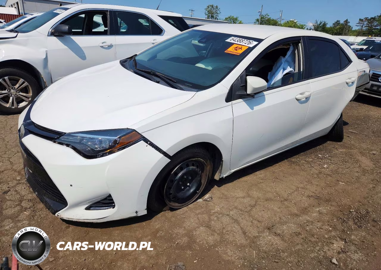 2018 Toyota Corolla Le VIN:5YFBURHE1JP781846 - 1