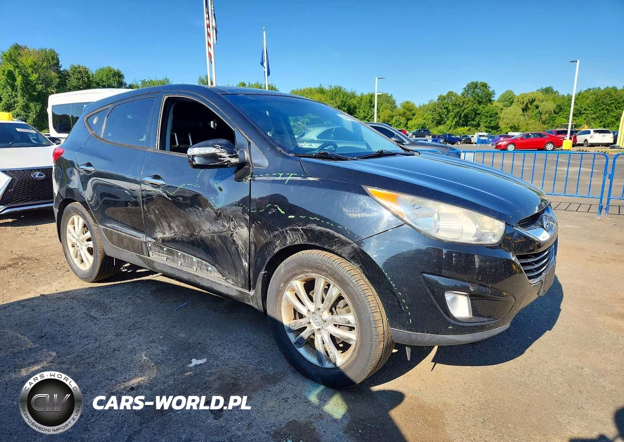 2012 Hyundai Tucson Limited VIN:KM8JUCAC2CU380681 - 4