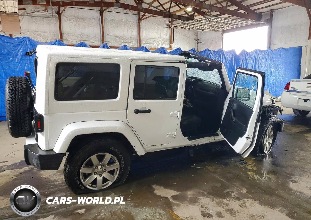 2012 Jeep Wrangler Unlimited Sahara VIN:1C4BJWEGXCL271343 - 3