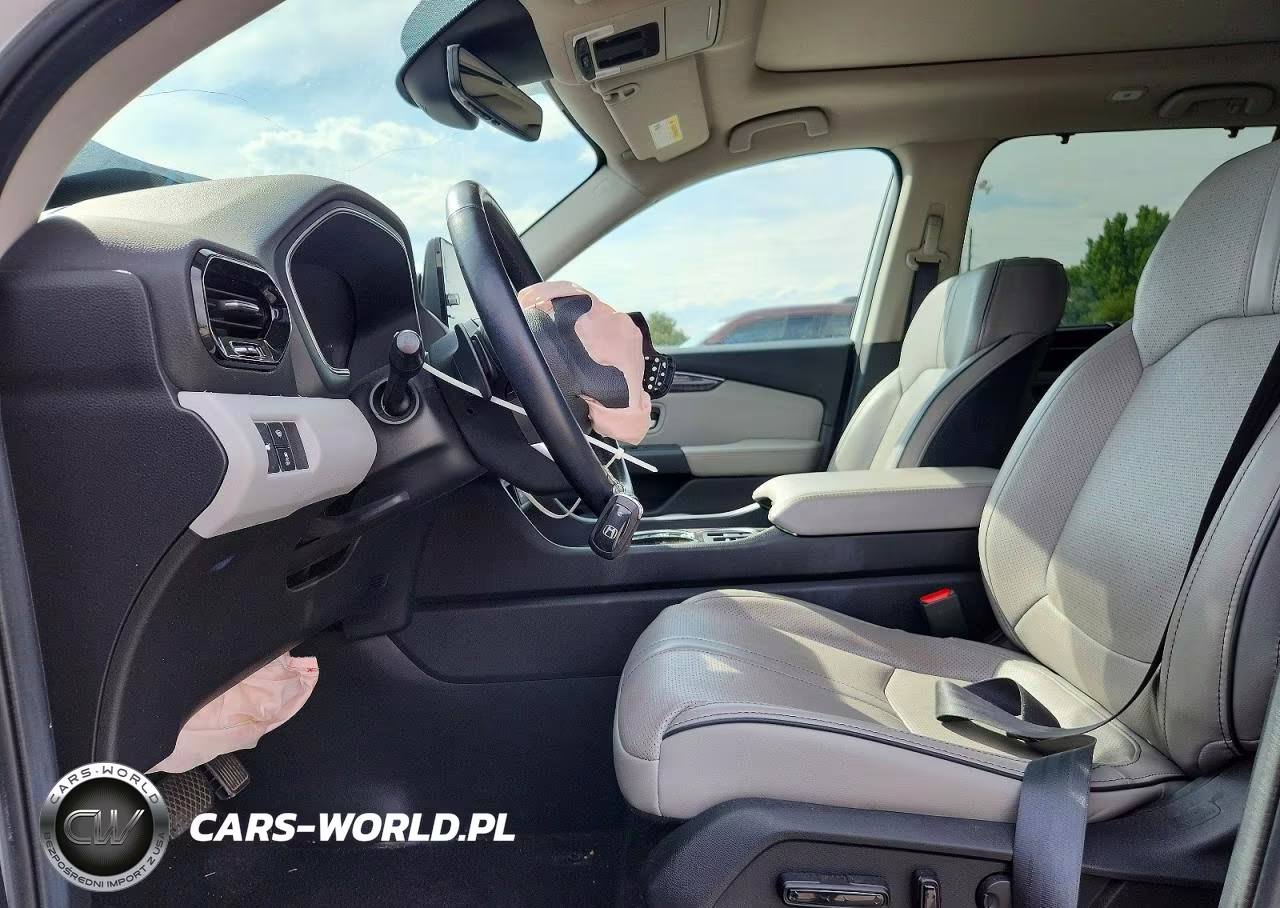 2023 Honda Pilot Elite VIN:5FNYG1H81PB001510 - 7