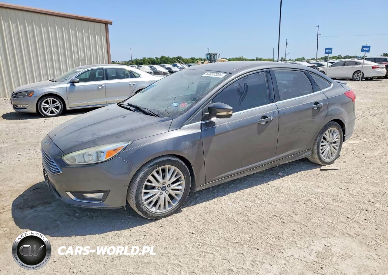 2015 Ford Focus Titanium VIN:1FADP3J23FL328041 - 1
