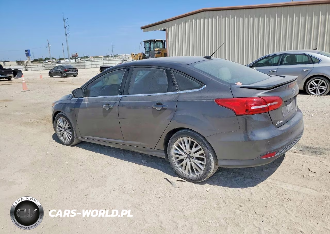 2015 Ford Focus Titanium VIN:1FADP3J23FL328041 - 2