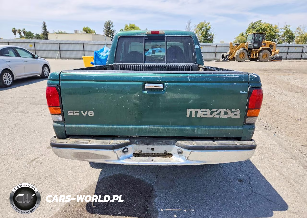 1999 Mazda B3000 Cab Plus VIN:4F4YR16V3XTM05710 - 6