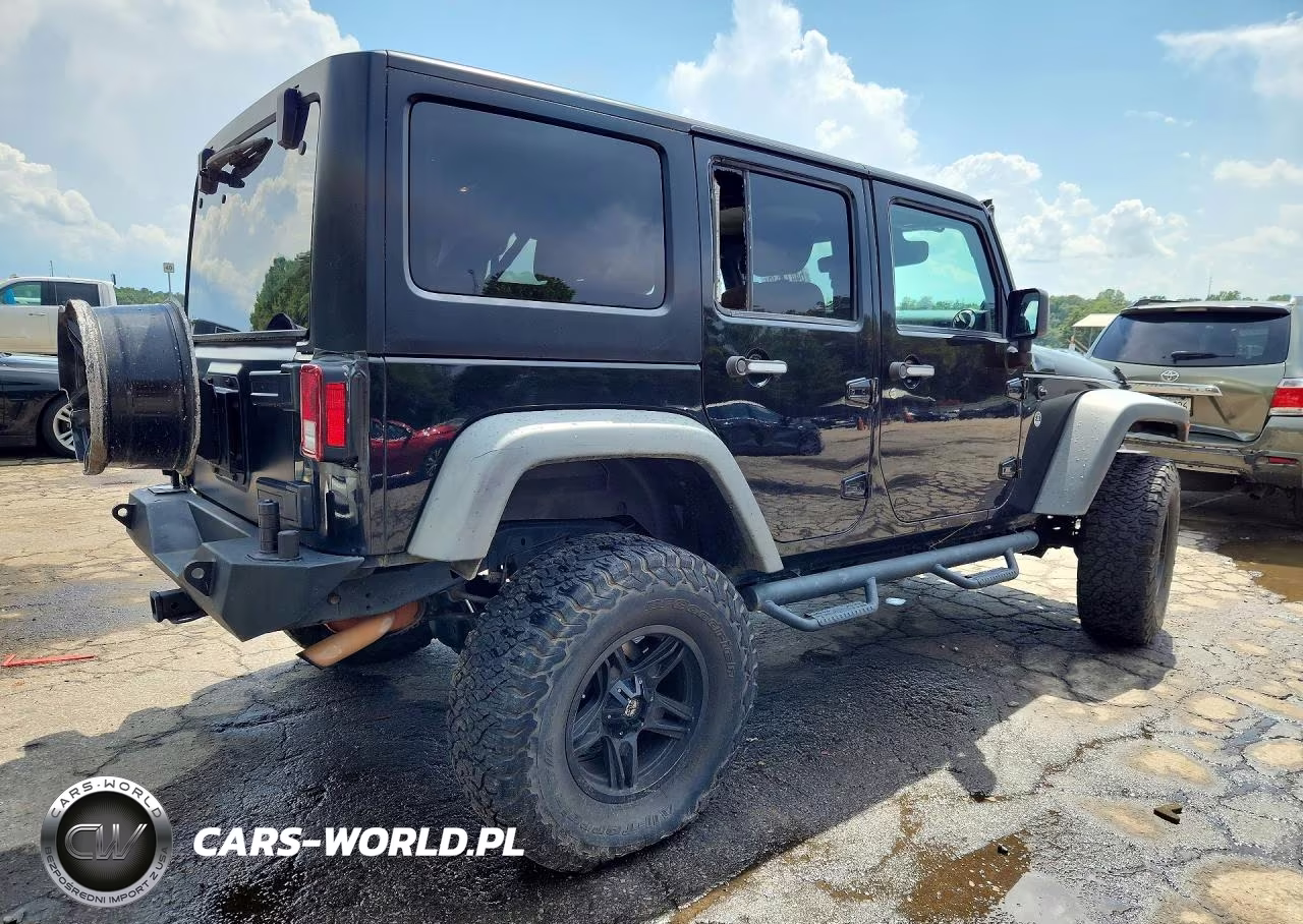 2011 Jeep Wrangler Unlimited Rubicon VIN:1J4BA6H12BL567831 - 3